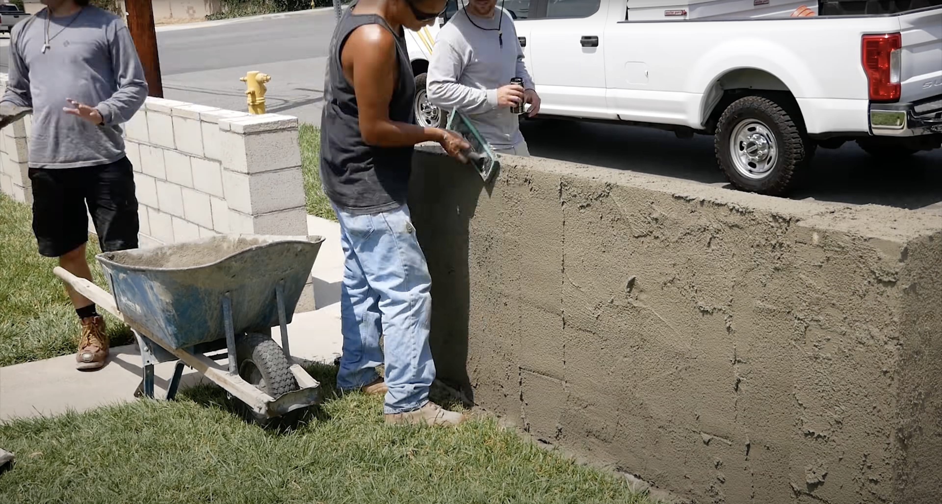 Concrete construction team working on foundation and site preparation
